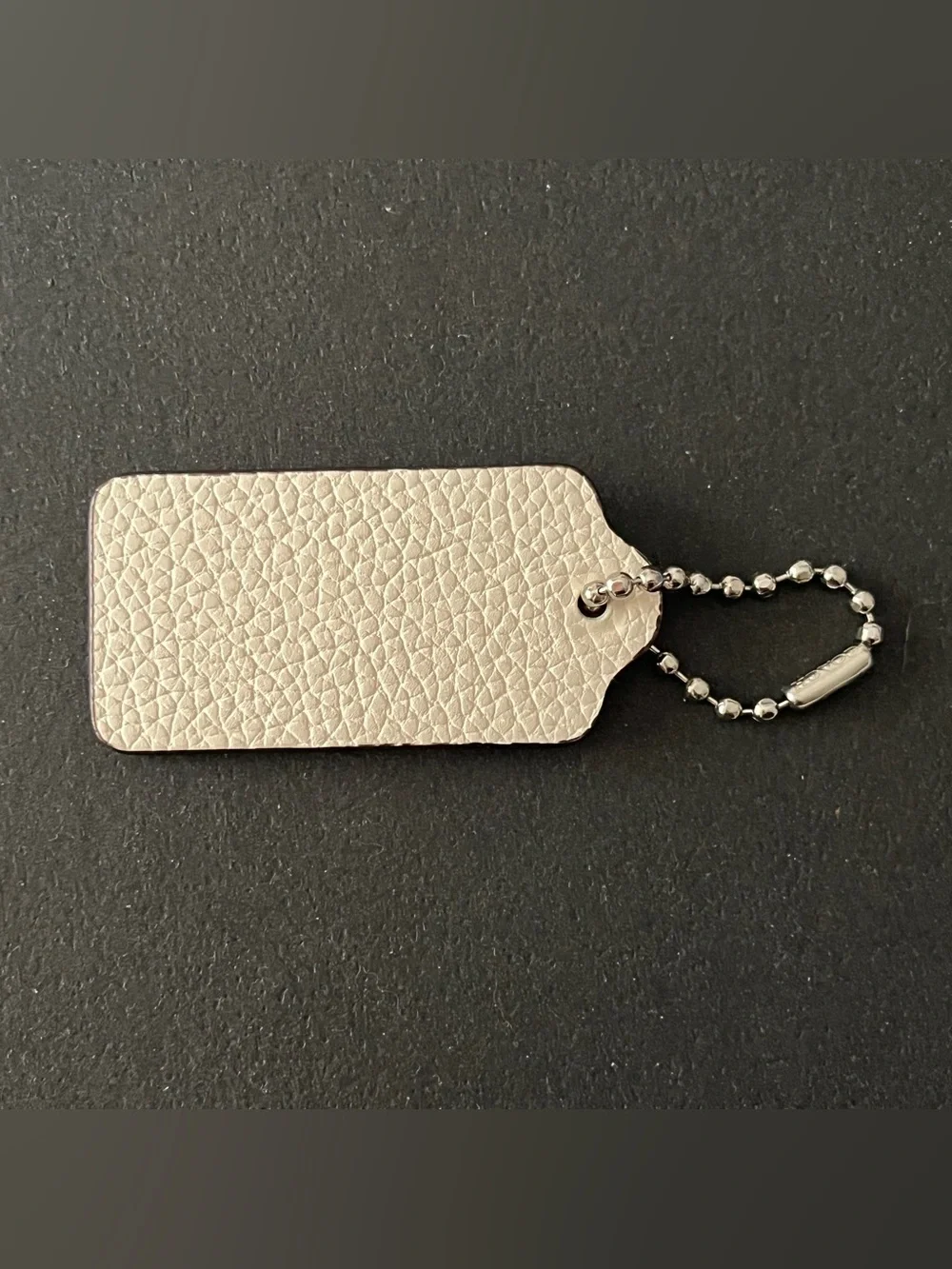 COACH New York hang tag
